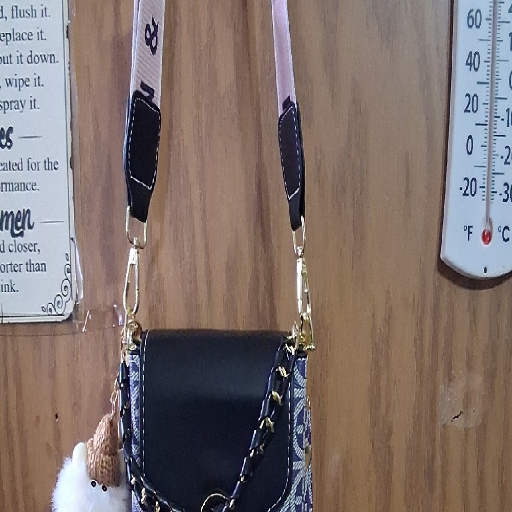 Stylish Black Crossbody Bag with Patterned Sides